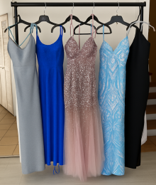 Dresses and gowns on a rack