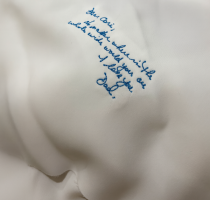Embroidered message on a shirt