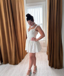 Model in short wedding dress